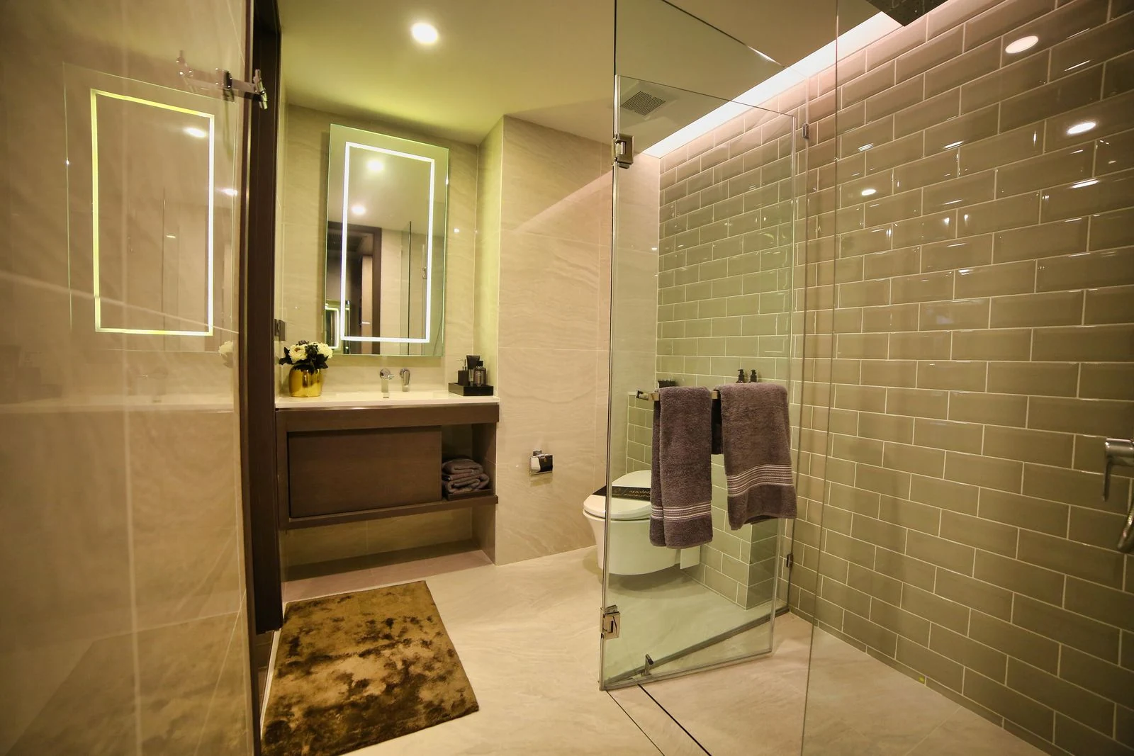Tiled shower and bathroom vanity